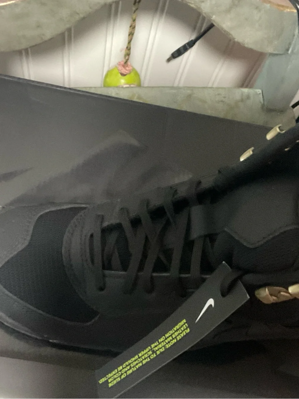 Nike Men's Black High-Top Sneakers with Gold Eyelets